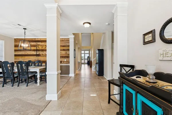 a lobby with furniture and window