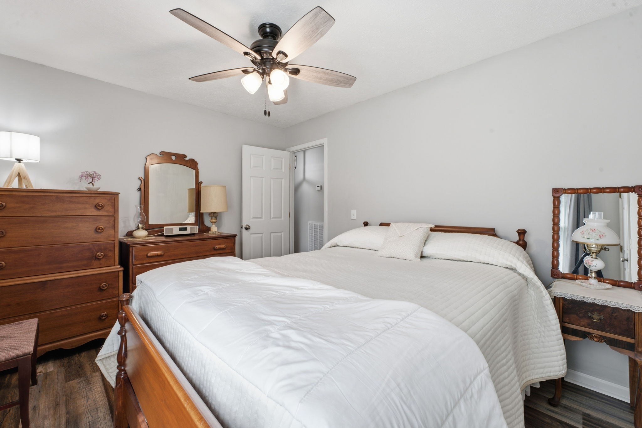 255 St Mary's Road Buffalo Valley, TN 38548 - Photo 29 of 36 a spacious bedroom with a bed and a chandelier