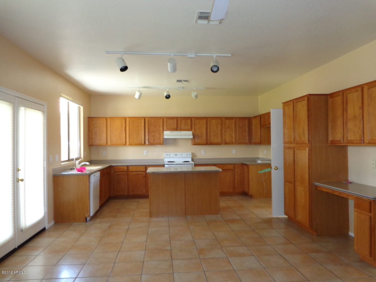 4017 East Agave Road Phoenix, AZ 85044 - Photo 5 of 18 Kitchen Island