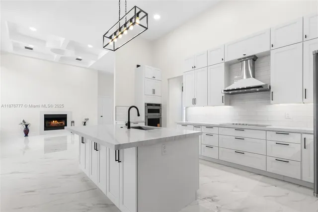 a kitchen with cabinets and white appliances