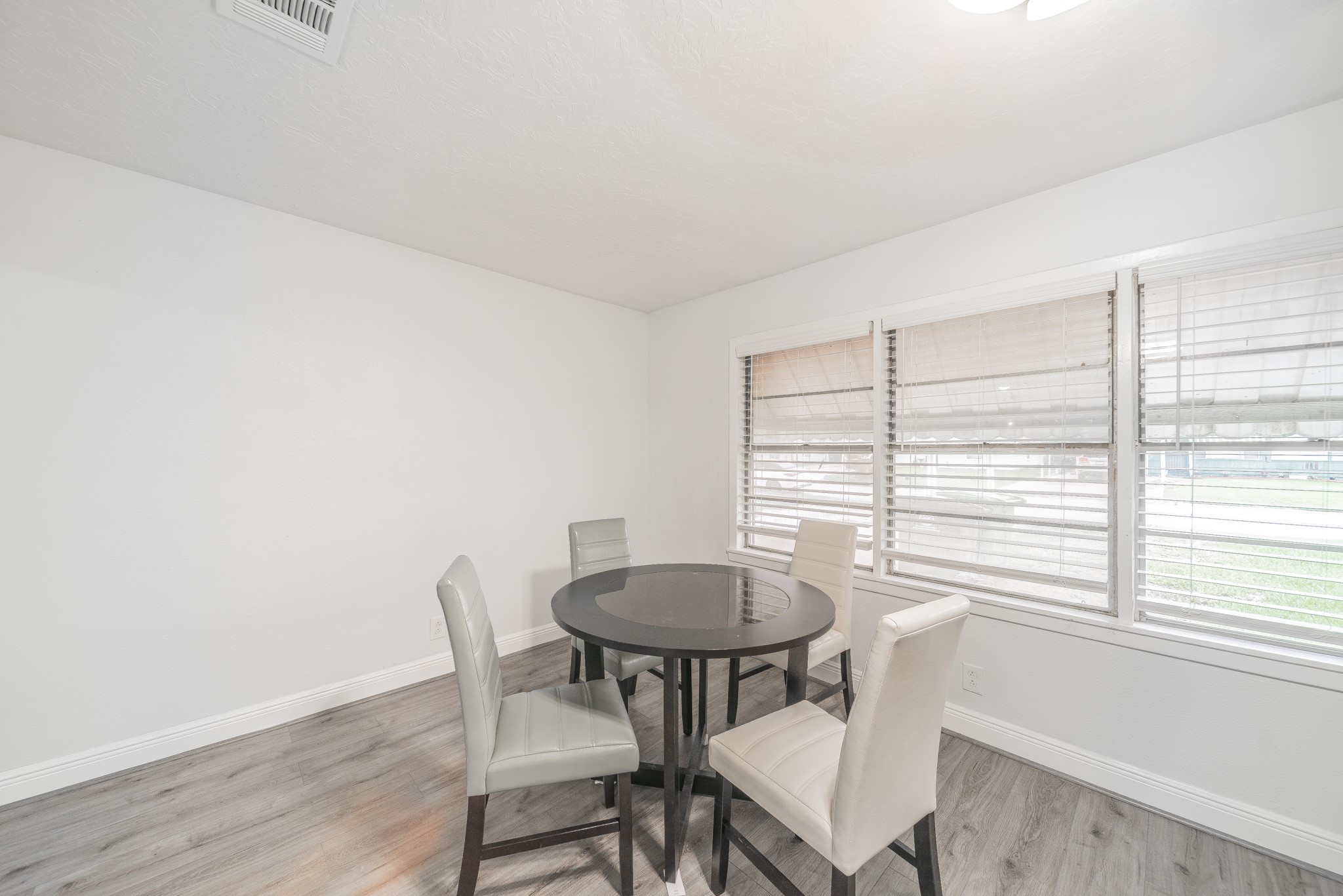 415 Gober Street Houston, TX 77017 - Photo 3 of 12 a view of a dining room with furniture and a window