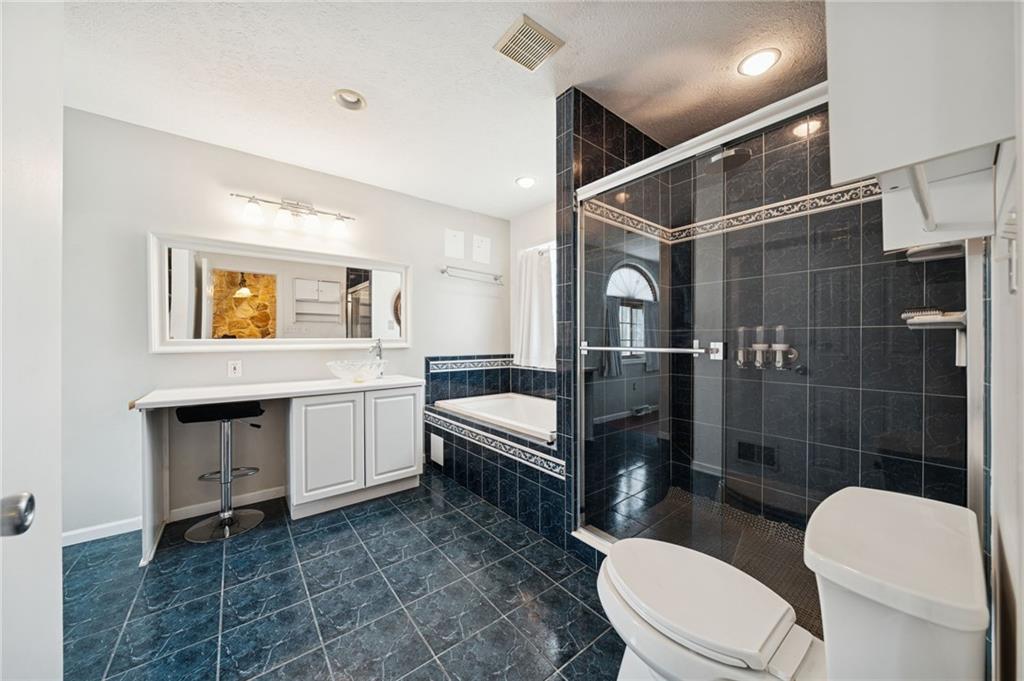 1512 Abers Creek Road Pittsburgh, PA 15239 - Photo 17 of 45 a bathroom with a toilet a sink and mirror
