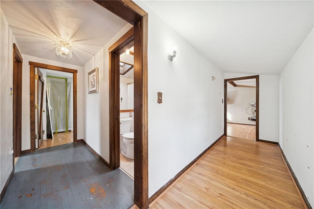 1512 Abers Creek Road Pittsburgh, PA 15239 - Photo 26 of 45 a view of a hallway with wooden floor and closet