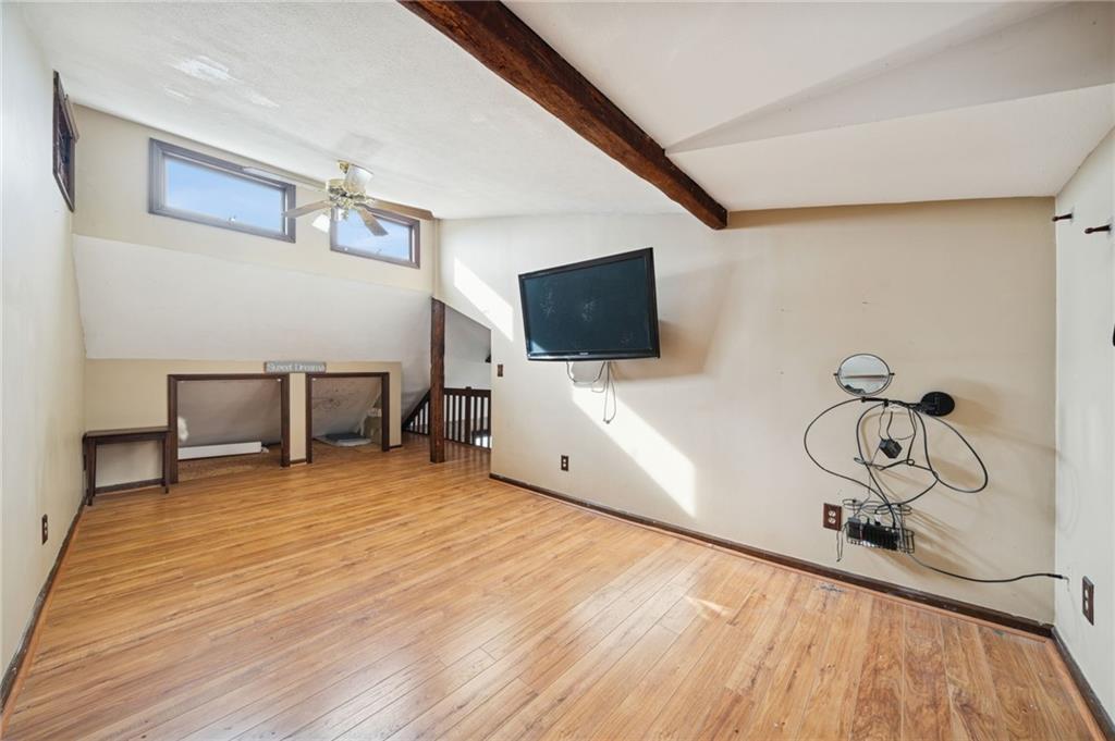 1512 Abers Creek Road Pittsburgh, PA 15239 - Photo 30 of 45 a view of a livingroom with a flat screen tv