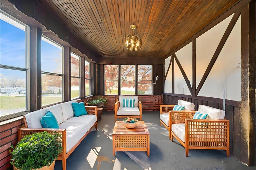 1512 Abers Creek Road Pittsburgh, PA 15239 - Photo 34 of 45 a living room with furniture and a large window