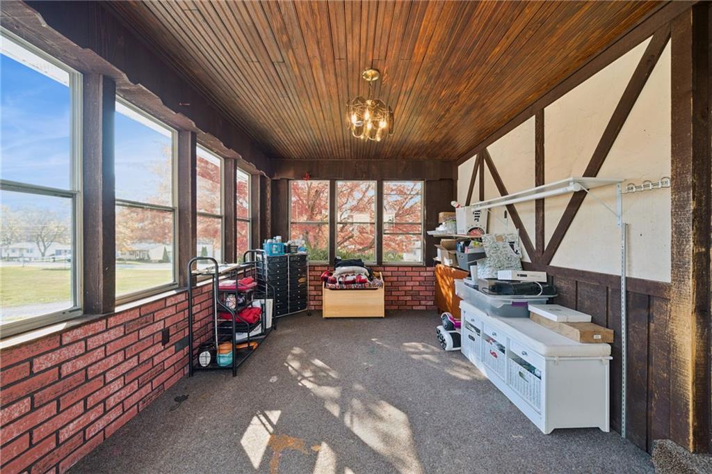 1512 Abers Creek Road Pittsburgh, PA 15239 - Photo 35 of 45 a bedroom with furniture and a large window