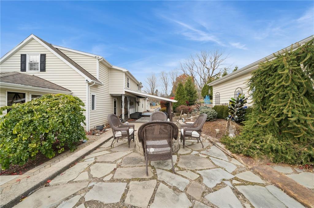 1512 Abers Creek Road Pittsburgh, PA 15239 - Photo 37 of 45 a front view of a house with garden