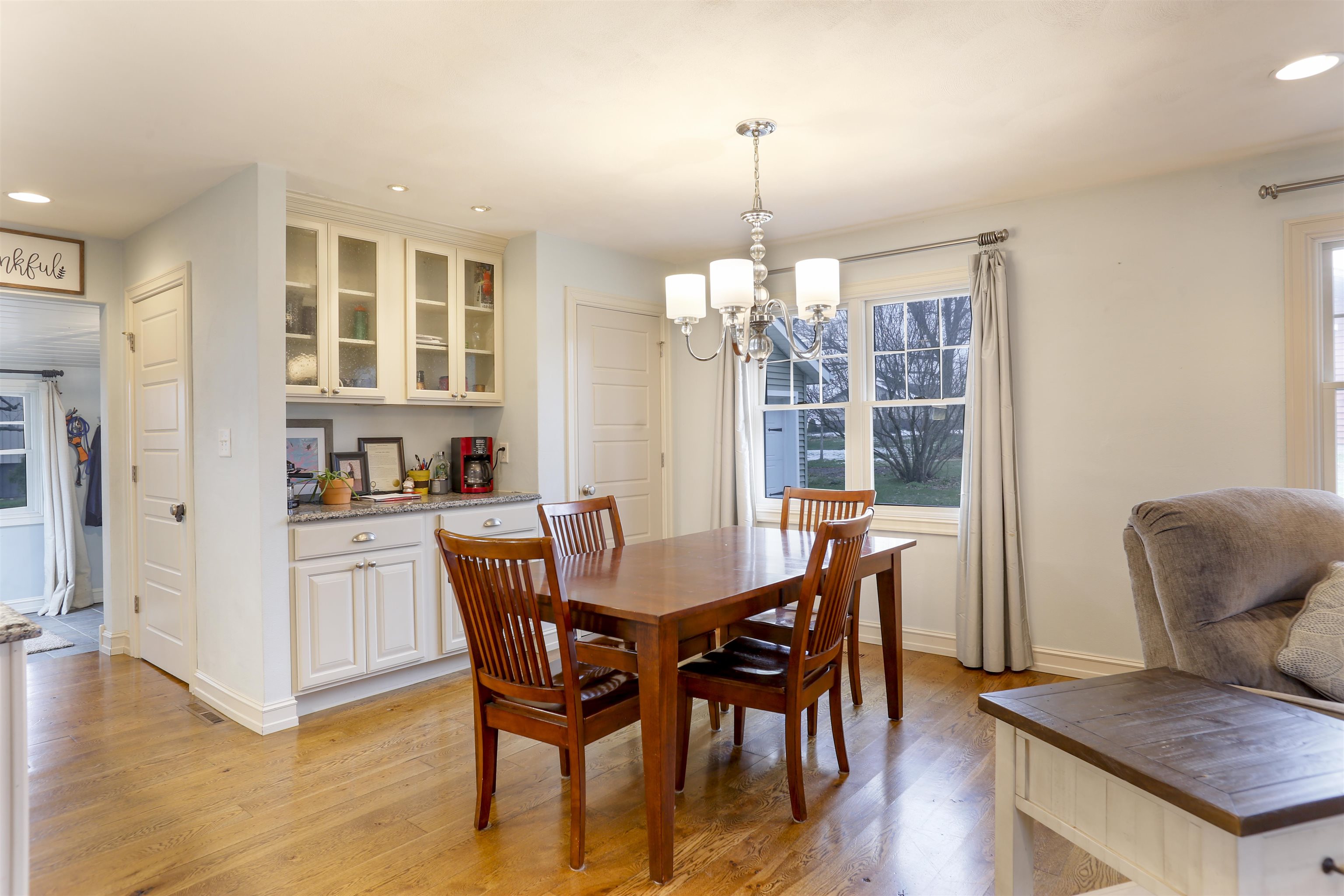 616 Davis Street Davis, IL 61019 - Photo 5 of 14 a view of a dining room with furniture window and wooden floor