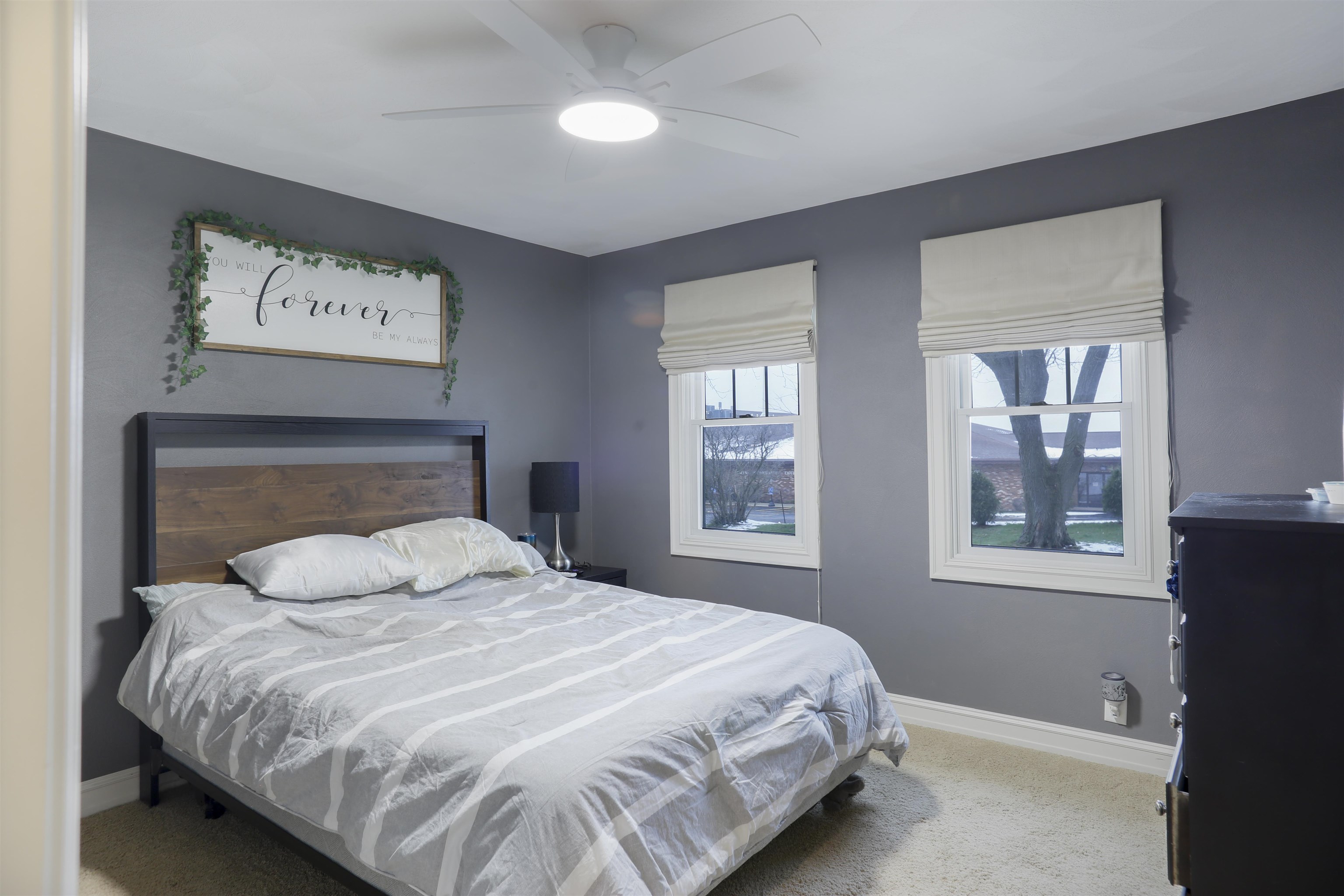 616 Davis Street Davis, IL 61019 - Photo 8 of 14 a bedroom with a bed and a window