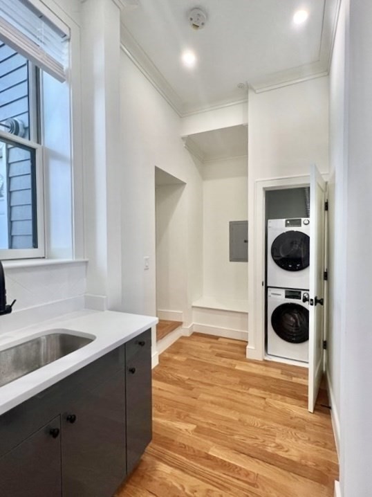 18 Grove Street, Unit 1 Boston, MA 02114 - Photo 6 of 13 a bathroom with a sink and a mirror