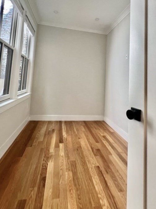 18 Grove Street, Unit 1 Boston, MA 02114 - Photo 7 of 13 a view of wooden floor