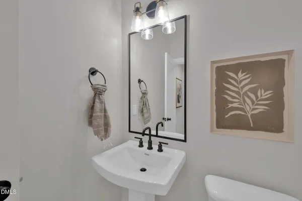 a view of staircase with rug