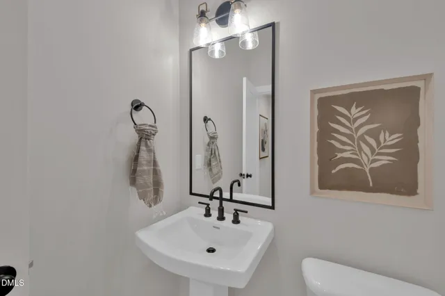 a kitchen with kitchen island a sink and a large window