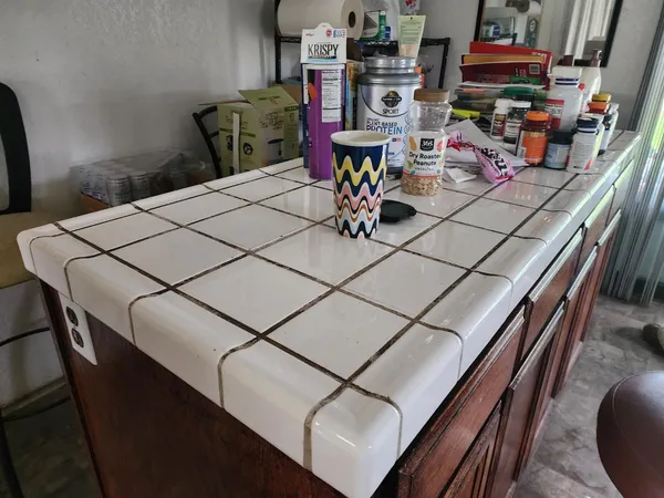 a view of a sink and dishwasher in a kitchen