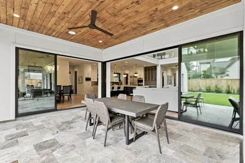 a kitchen with granite countertop a sink and a stove