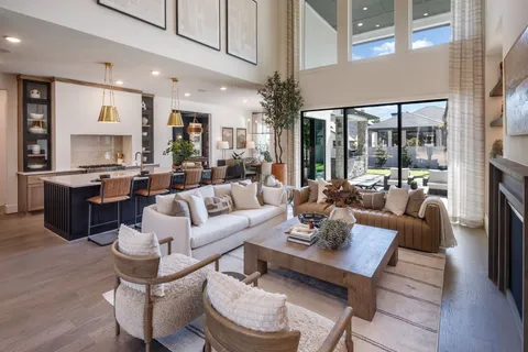 a kitchen with a sink a counter space and stainless steel appliances