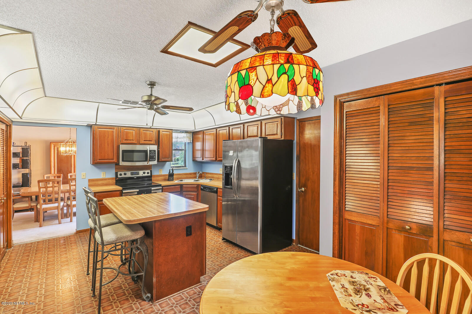 5404 Spring Brook Road Jacksonville, FL 32277 - Photo 8 of 28 Kitchen w/lots of cab. Center island.