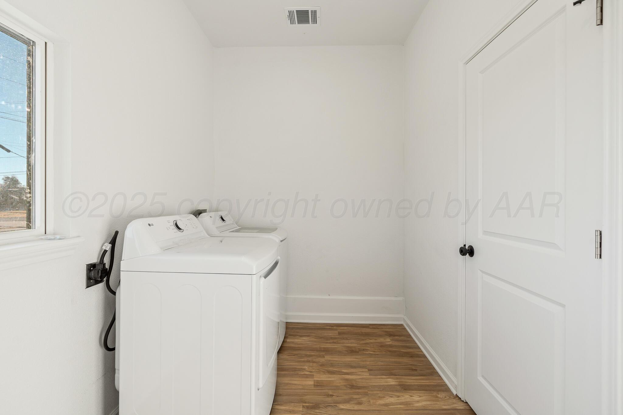 220 Sims Street Clarendon, TX 79226 - Photo 17 of 17 a utility room with dryer and washer