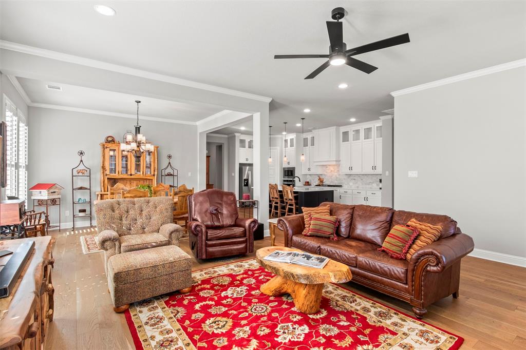 2002 Kati Jane Lane Midlothian, TX 76065 - Photo 24 of 30 a living room with furniture kitchen view and a chandelier