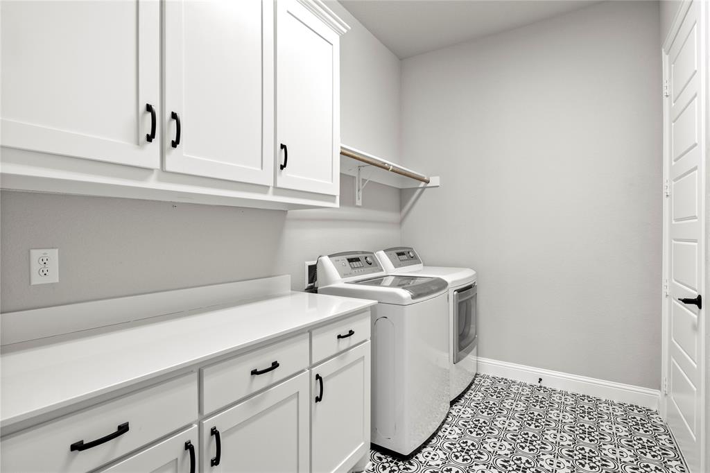 2002 Kati Jane Lane Midlothian, TX 76065 - Photo 26 of 30 a view of a storage & utility room with sink washer and dryer