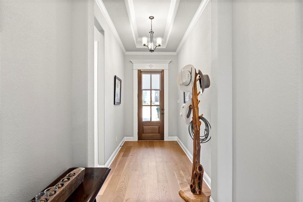 2002 Kati Jane Lane Midlothian, TX 76065 - Photo 4 of 30 a view of a livingroom with a furniture and a chandelier