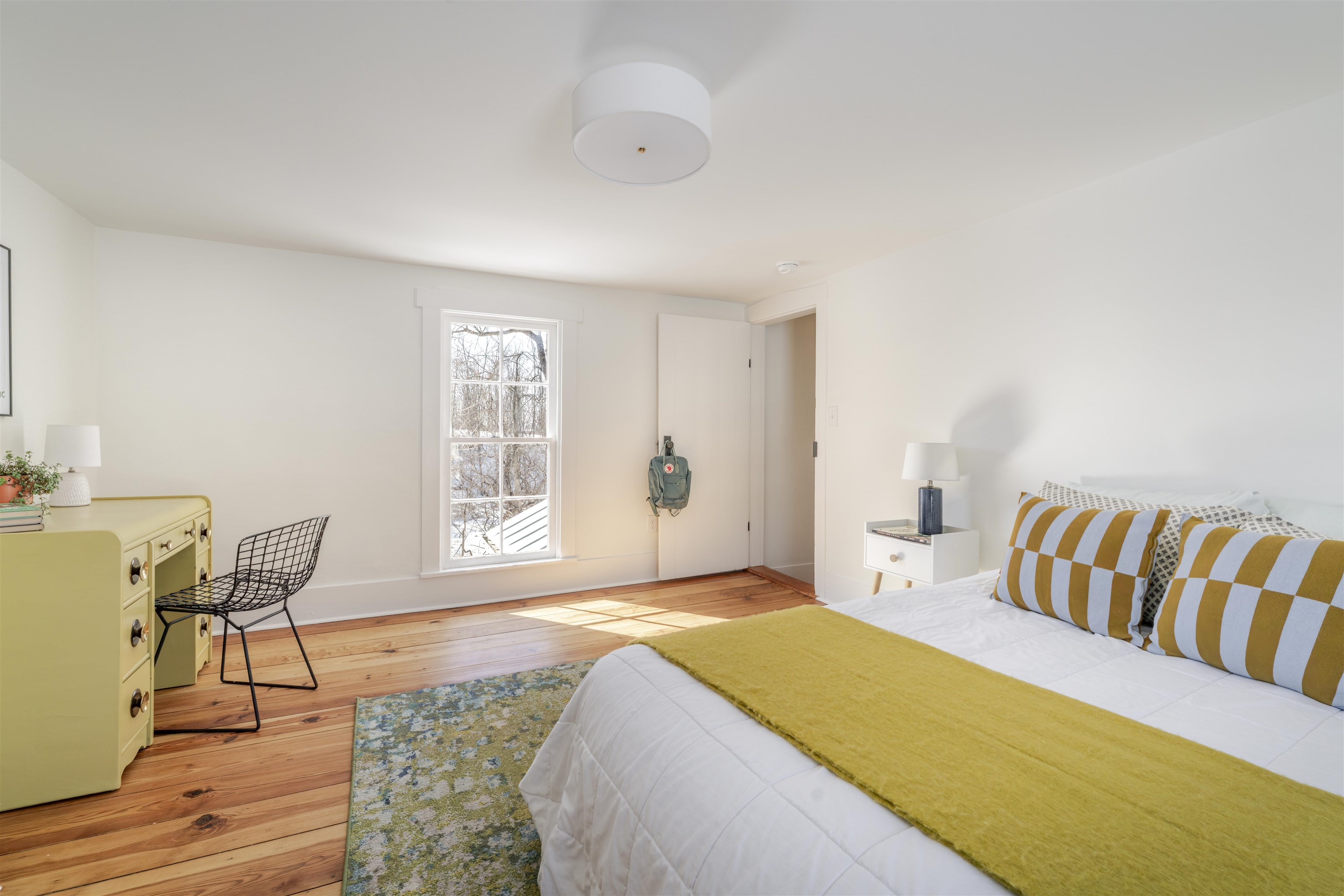 675 Stone Spring Road Harrisonburg, VA 22801 - Photo 25 of 39 a spacious bedroom with a bed and wooden floor