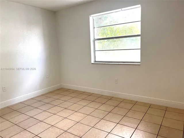 a view of a room & utility room