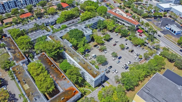 a view of street with parked cars