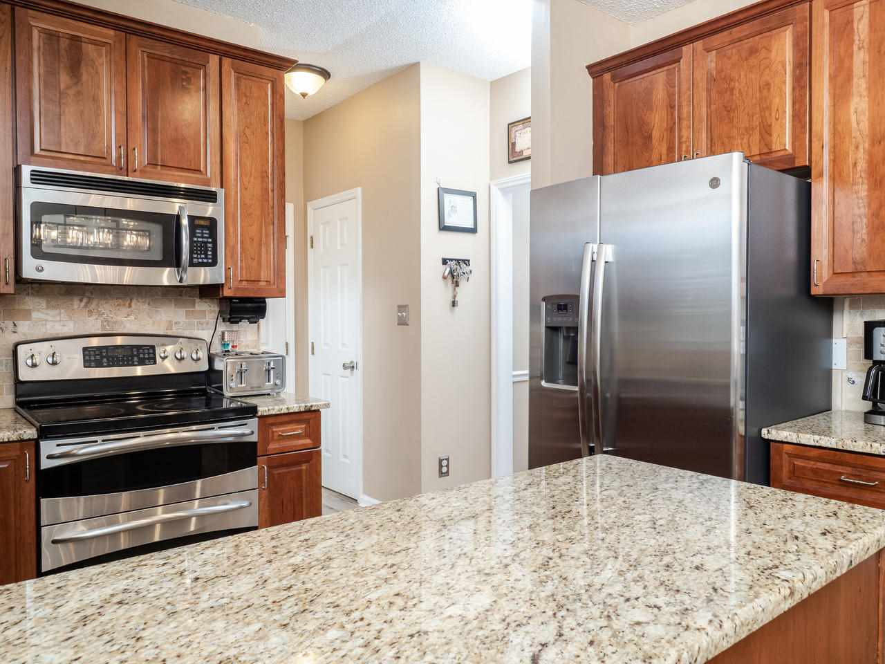 8604 Harps Mill Road Raleigh, NC 27615 - Photo 5 of 26 Stainless steel appliances