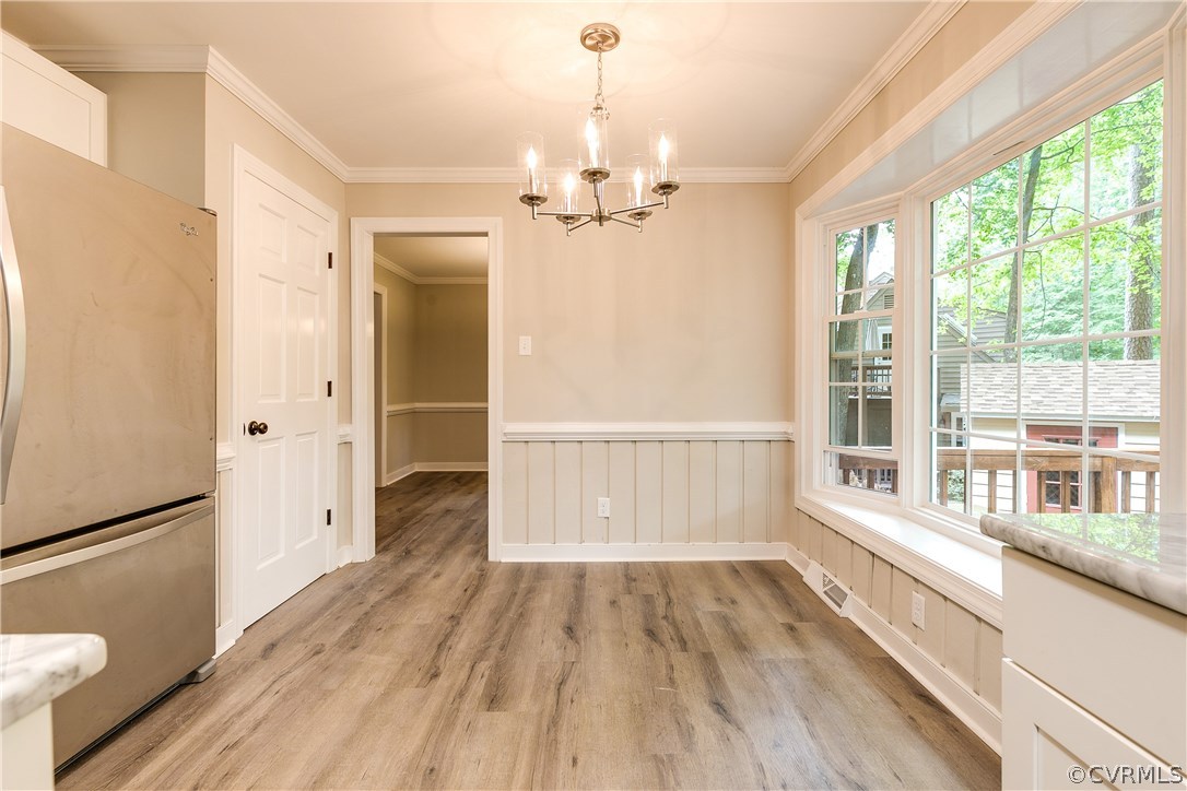 13602 Winterberry Ridge Midlothian, VA 23112 - Photo 17 of 47 a view of a room with wooden floor and a large window