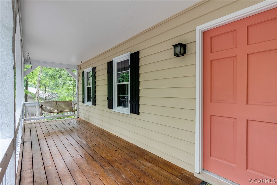 13602 Winterberry Ridge Midlothian, VA 23112 - Photo 3 of 47 a view of outdoor space with wooden floor and windows