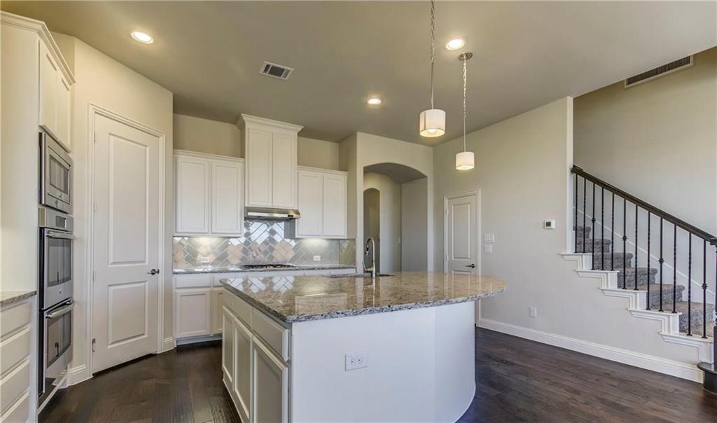 3012 Bold Ruler Road Celina, TX 75009 - Photo 4 of 13 Kitchen and island