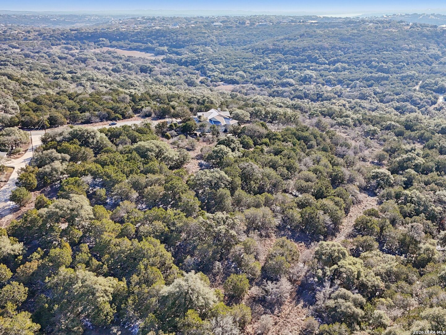 358 Toucan Drive Spring Branch, TX 78070 - Photo 11 of 30 an aerial view of house with yard and mountain view in back