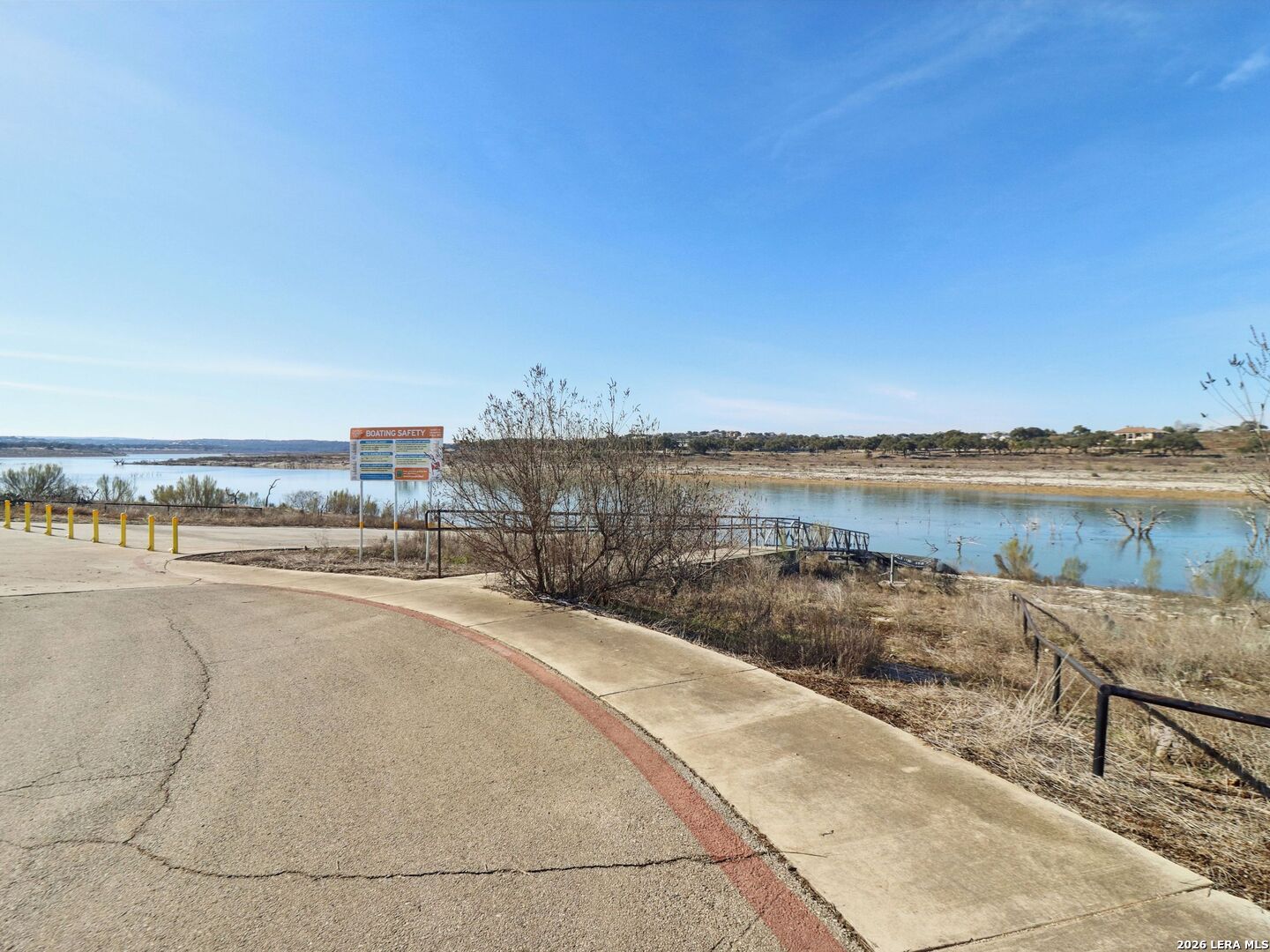 358 Toucan Drive Spring Branch, TX 78070 - Photo 17 of 30 a view of a lake with houses in the back