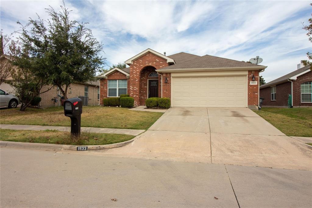 1933 Joe Pool Drive Little Elm, TX 75068 - Photo 1 of 23 a front view of a house with a yard