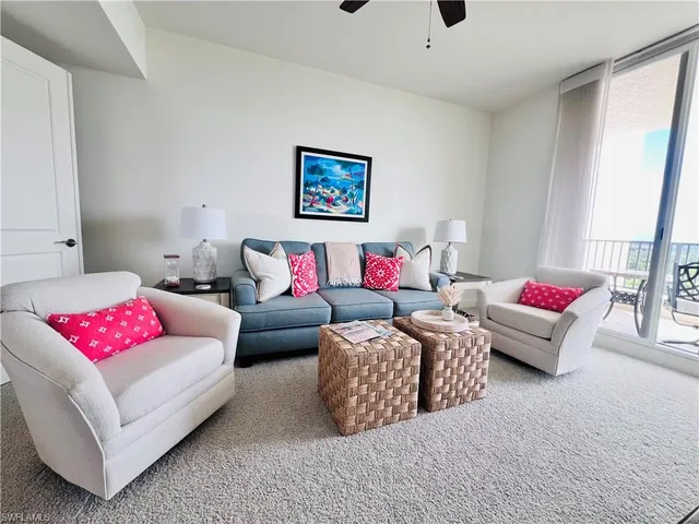 a living room with furniture and a couch