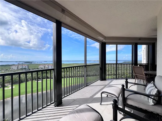 a balcony with furniture