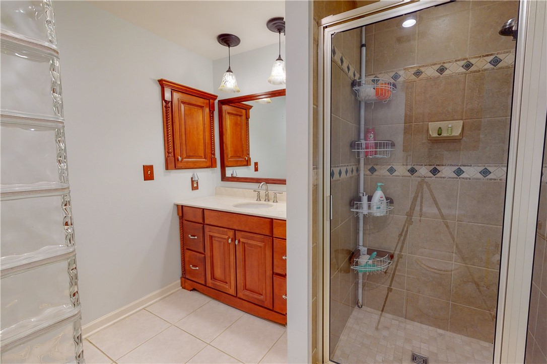 19 Downs Loop Clemson, SC 29631 - Photo 13 of 23 Owner's bathroom with raised vanity, fully tiled s