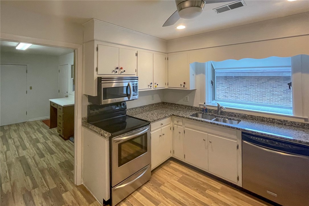 19 Downs Loop Clemson, SC 29631 - Photo 9 of 23 Kitchen with granite counters, stainless appliance