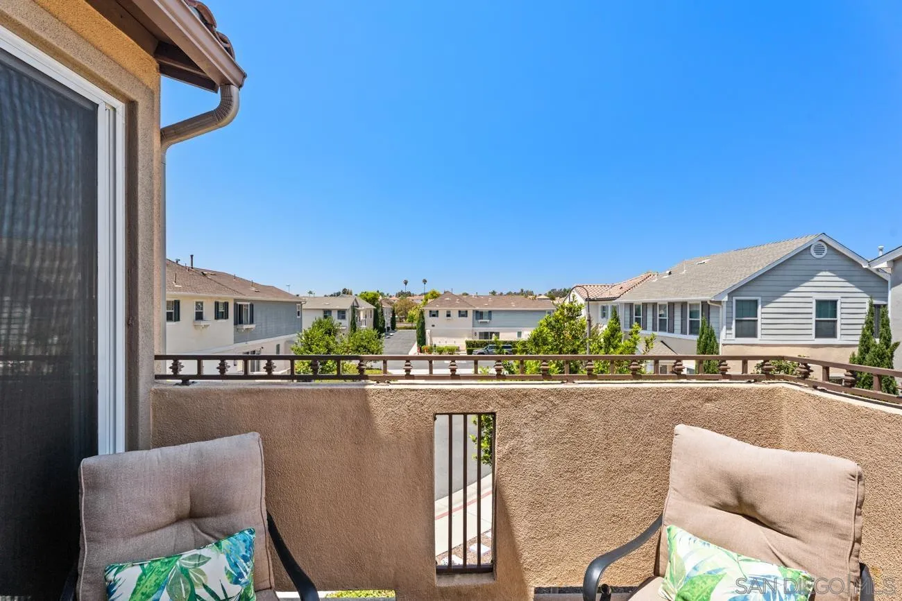 4326 Star Path Way, Unit 1 Oceanside, CA 92056 - Photo 22 of 46 a balcony with table and chairs