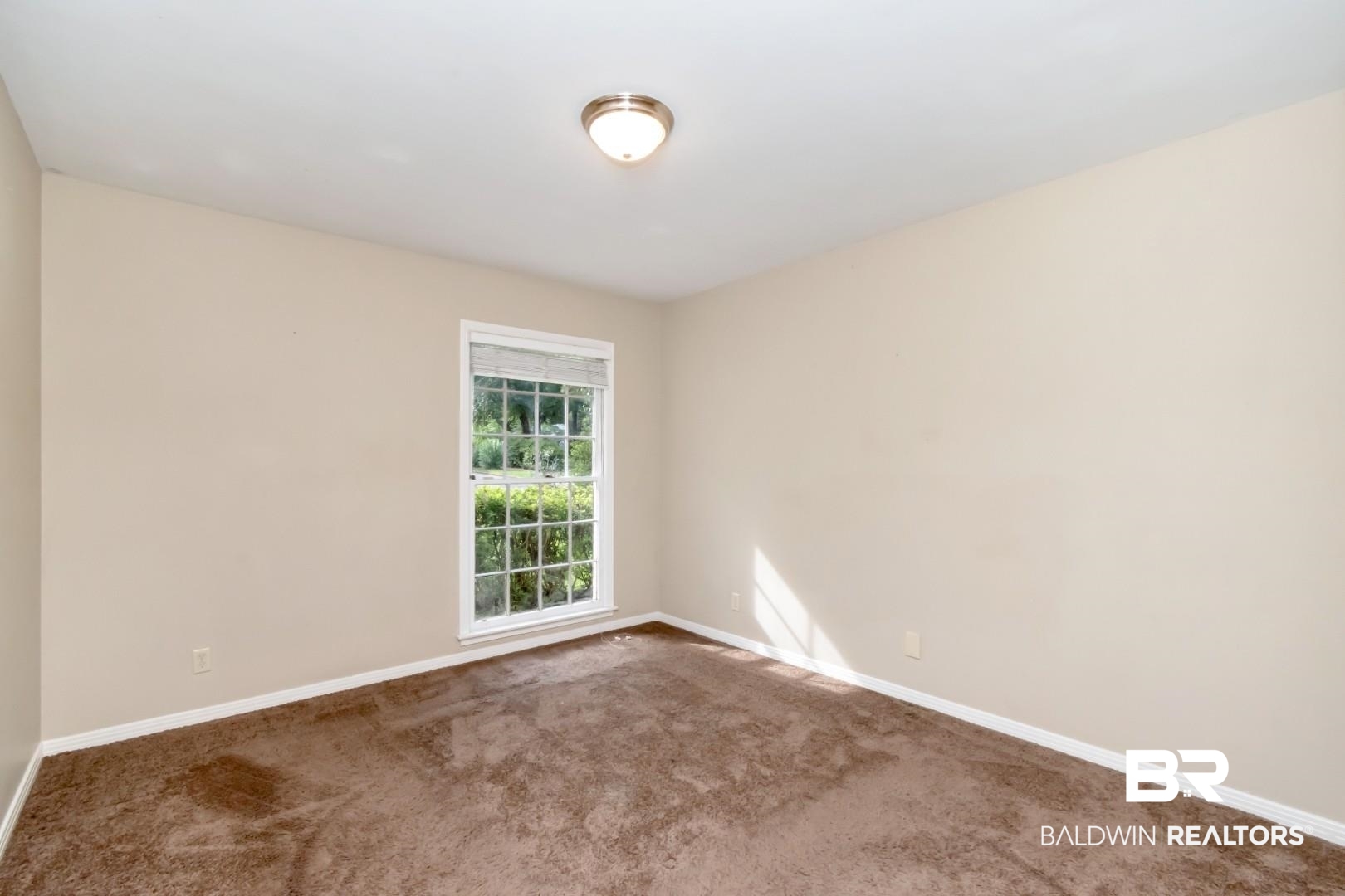 324 Judson Drive Mobile, AL 36608 - Photo 13 of 20 Spare room with baseboards and carpet flooring