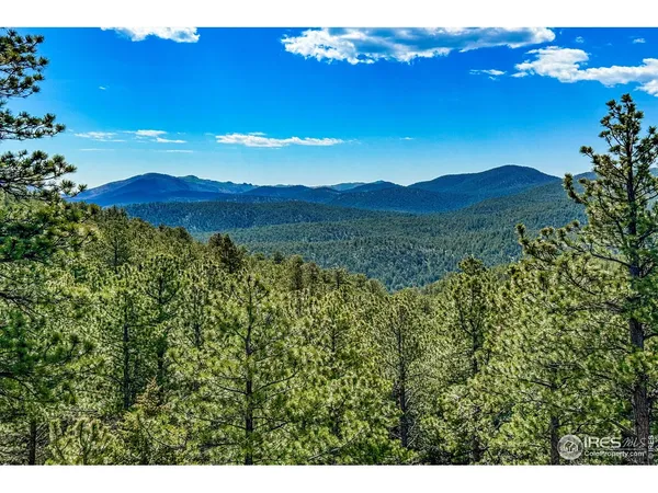 a view of an outdoor space and mountain view