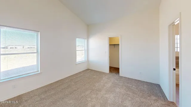 an empty room with windows