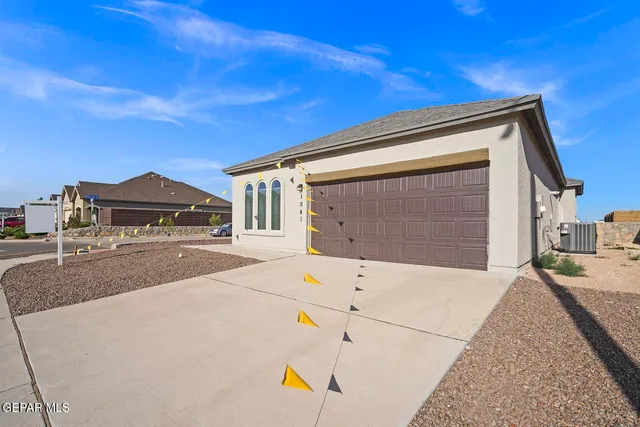 a house with trees in front of it