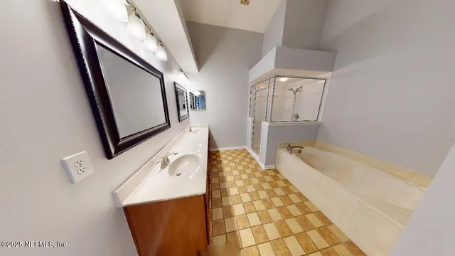 a bathroom with a bathtub and a sink