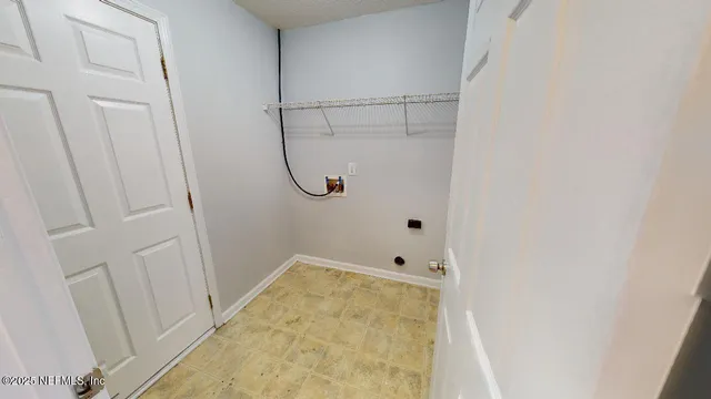 a bathroom with a granite countertop shower and a sink