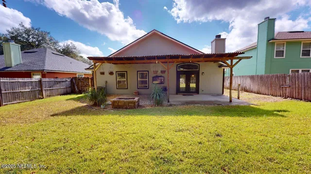 a view of a house with swimming pool and porch