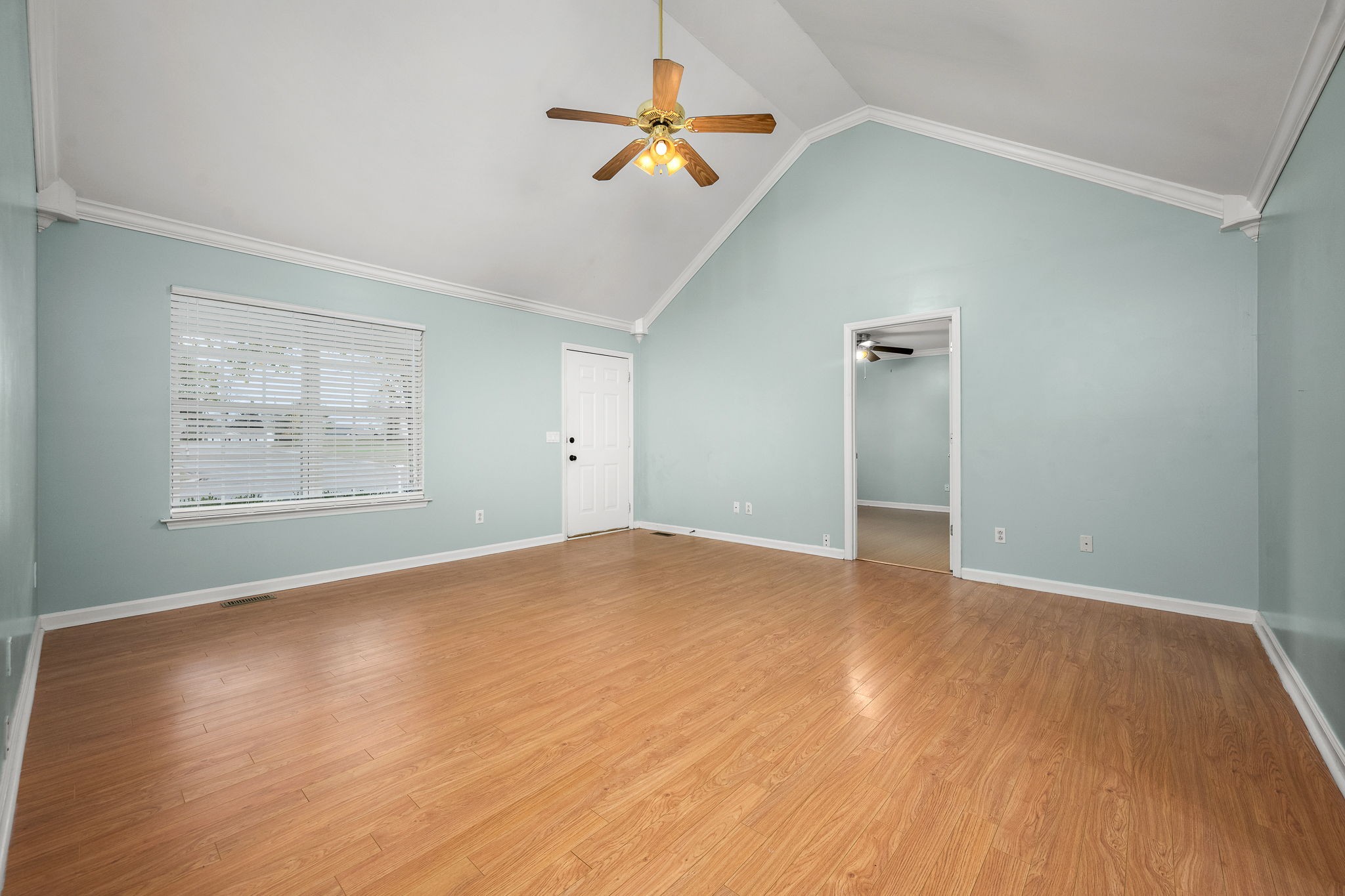 2403 Medford Campbell Boulevard Murfreesboro, TN 37127 - Photo 11 of 35 an empty room with wooden floor ceiling fan and window
