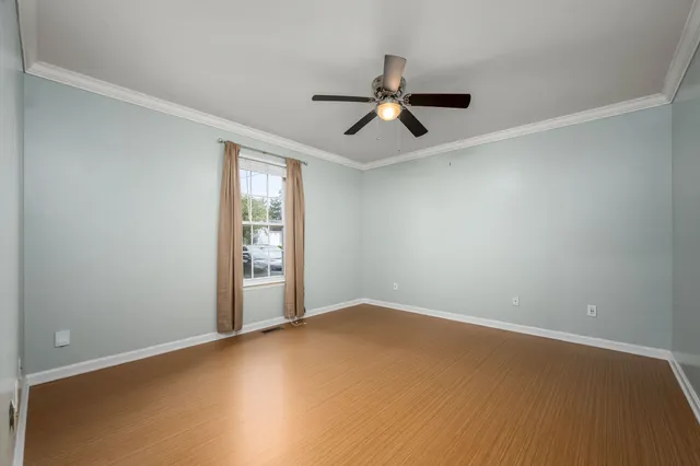 a view of a big room with carpet