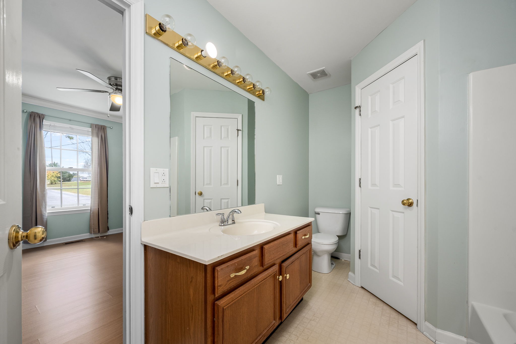 2403 Medford Campbell Boulevard Murfreesboro, TN 37127 - Photo 21 of 35 a bathroom with a sink and a mirror